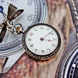 Nice silver nun's pocket watch with badge from the 1800s.