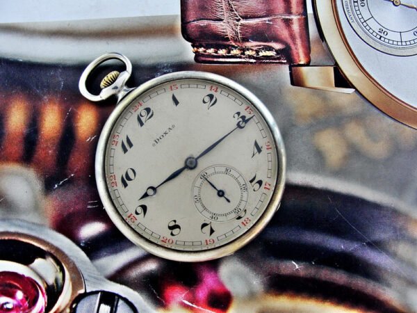 Doxa silver pocket watch in a very nice case with a nice dial from the 1920s
