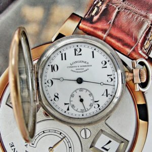 Longines double-lid silver pocket watch from the early 1900s.