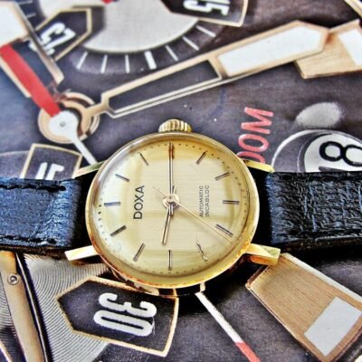 Beautiful 14K gold colored women's Doxa automatic watch with box from the 1970s