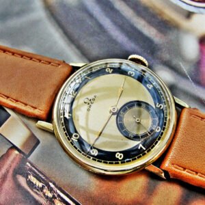 Beautiful bicolor dial 14-carat gold Omega watch from the 1940s.