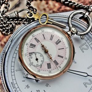 Rare silver pocket watch with key from the 1800s.