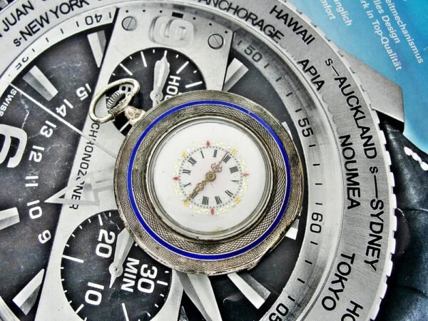 A nice silver pocket watch with a flower motif from the early 1900s. - Image 7