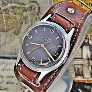 Nice Doxa watch from 1956 with military strap with compass.