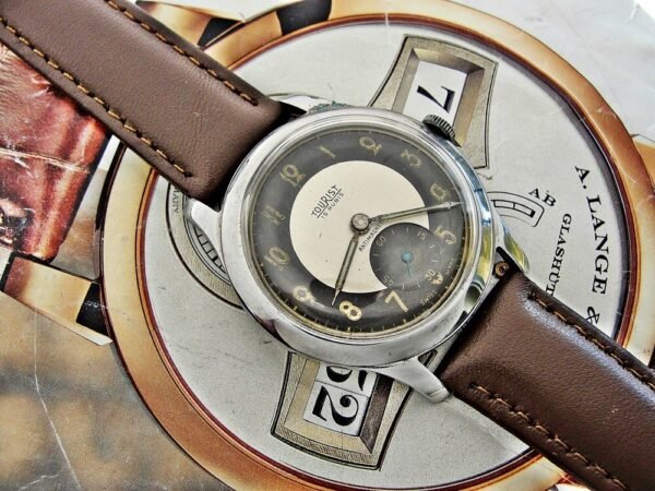 Nice bicolor dial Tourist watch from the 1950s - Image 9