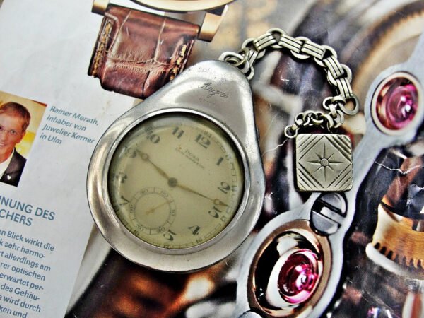 Nice Doxa pocket watch with metal holder from the 1920s - Image 18