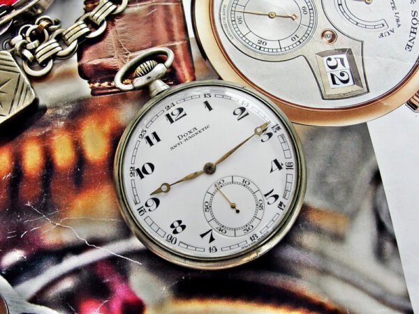 Nice Doxa pocket watch with metal holder from the 1920s - Image 6