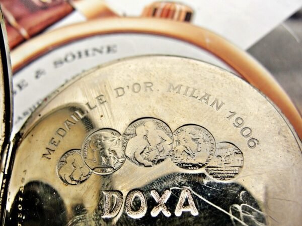 Nice Doxa pocket watch with porcelain dial and nice chain from the 1920 - Image 11