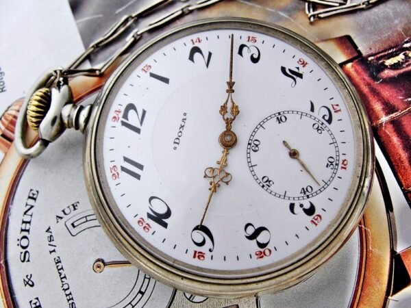 Nice Doxa pocket watch with porcelain dial and nice chain from the 1920 - Image 16