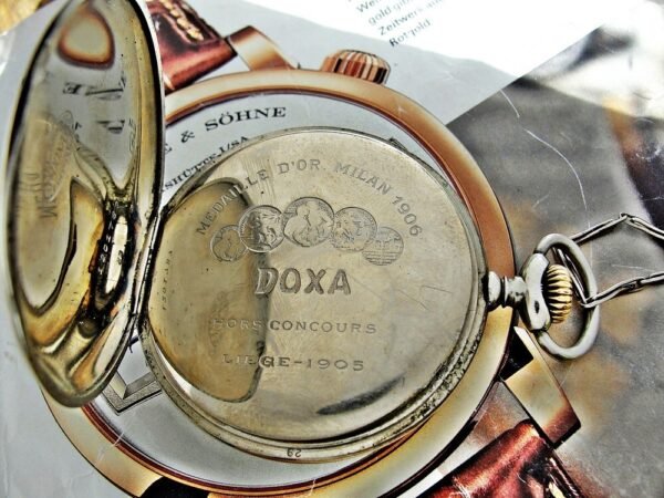 Nice Doxa pocket watch with porcelain dial and nice chain from the 1920 - Image 17