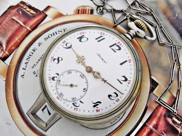 Nice Doxa pocket watch with porcelain dial and nice chain from the 1920 - Image 3