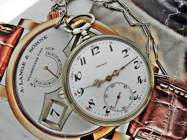 Nice Doxa pocket watch with porcelain dial and nice chain from the 1920 - Image 4
