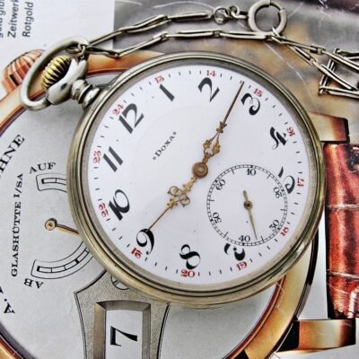 Nice Doxa pocket watch with porcelain dial and nice chain from the 1920