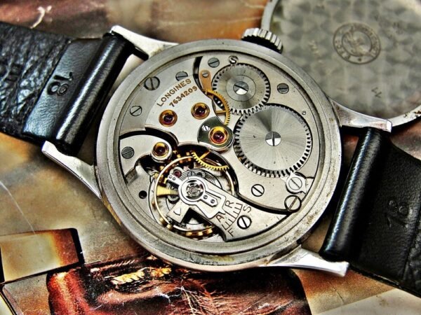 A very nice steel case Longines watch from 1947 - Image 12