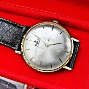 Beautiful 14k gold Doxa by Synchron watch from the 1970s with box.