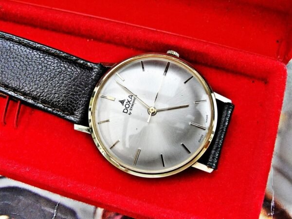 Beautiful 14k gold Doxa by Synchron watch from the 1970s with box.